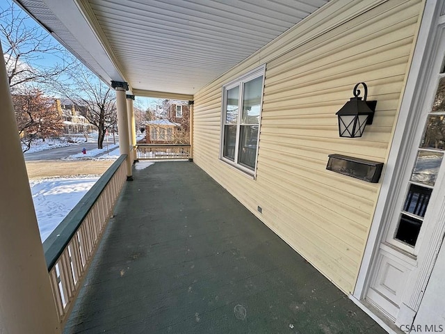 view of snow covered patio