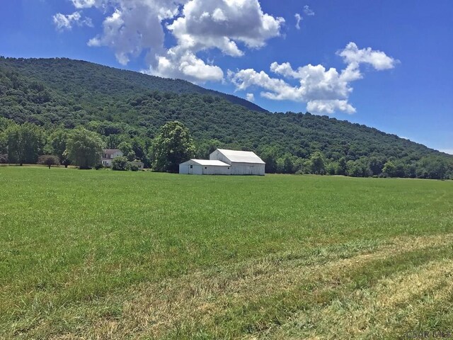 view of mountain feature featuring a rural view