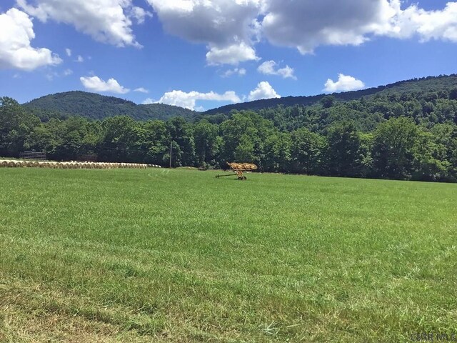 property view of mountains with a rural view