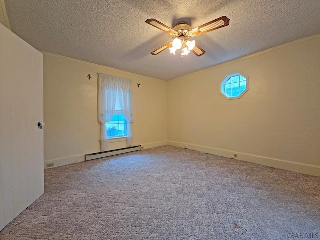 spare room featuring carpet, a baseboard heating unit, a textured ceiling, and ceiling fan