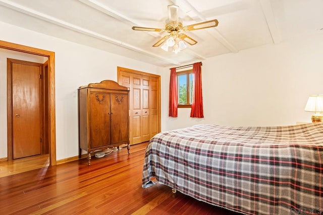 129 Berkey Dr, Johnstown, PA 15904 - bedroom with wood finished floors, beam ceiling, and a ceiling fan