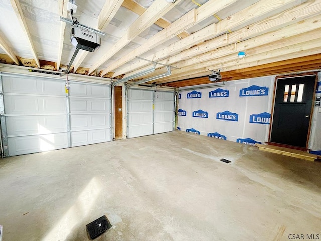 garage featuring a garage door opener