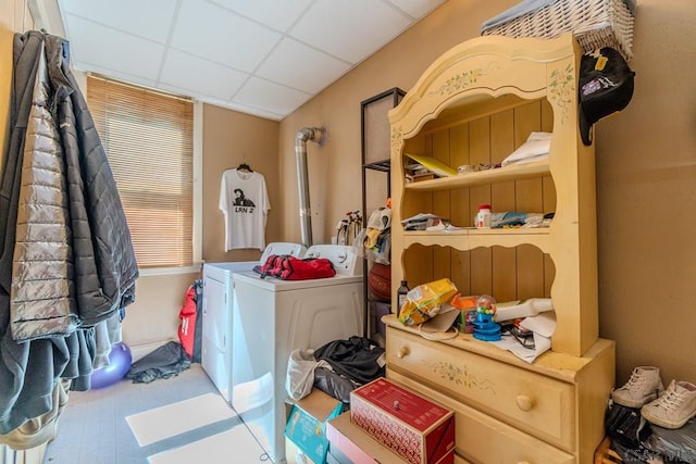 clothes washing area with separate washer and dryer