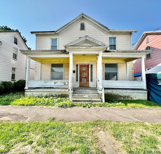 view of front of house featuring covered porch