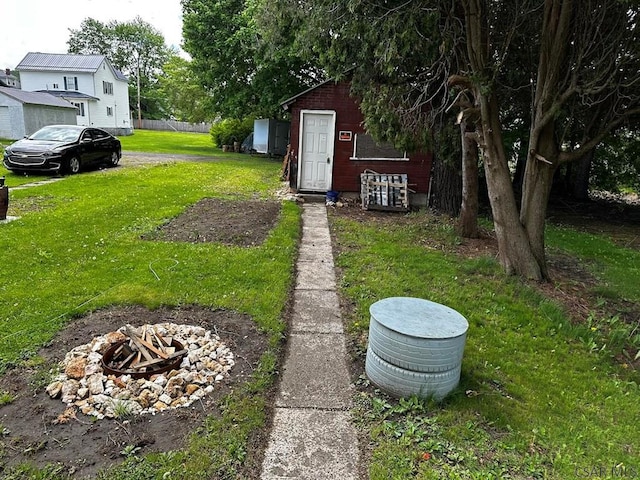 913 Jefferson Ave, Portage, PA 15946 - view of grassy yard featuring a fire pit