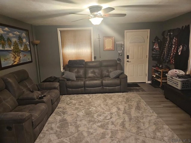913 Jefferson Ave, Portage, PA 15946 - living room with a ceiling fan and dark wood-type flooring