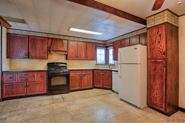 kitchen with custom exhaust hood, sink, and white appliances