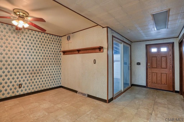 foyer with ceiling fan