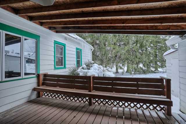 view of snow covered deck