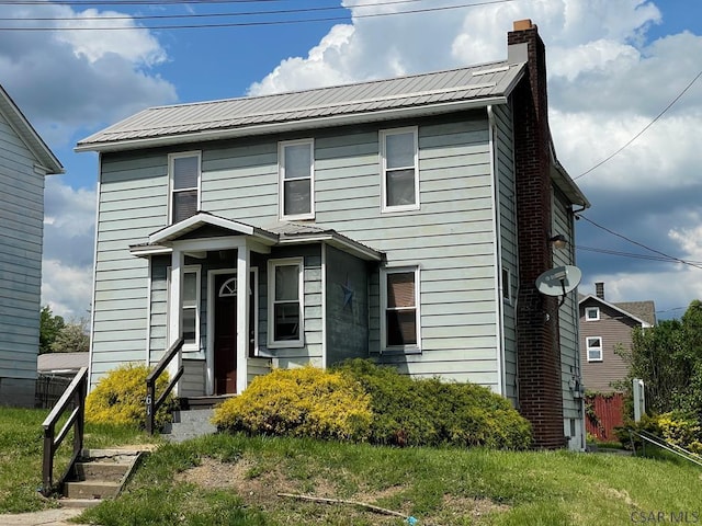 161 Stone St, Johnstown, PA 15906 - view of front of home with a chimney and metal roof