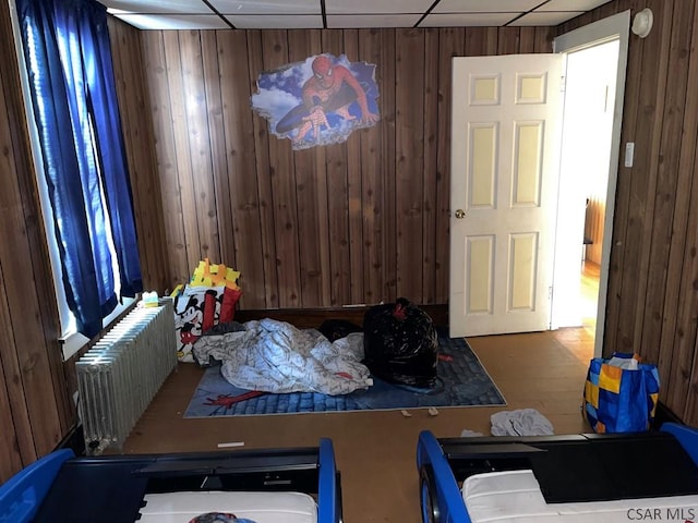 161 Stone St, Johnstown, PA 15906 - interior space with radiator, wood walls, and a paneled ceiling