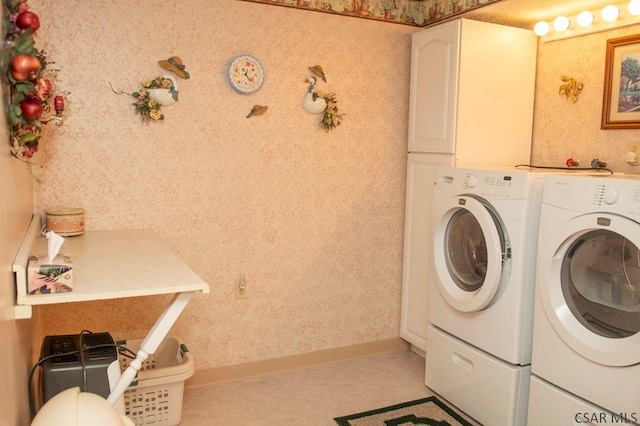 washroom featuring washing machine and dryer