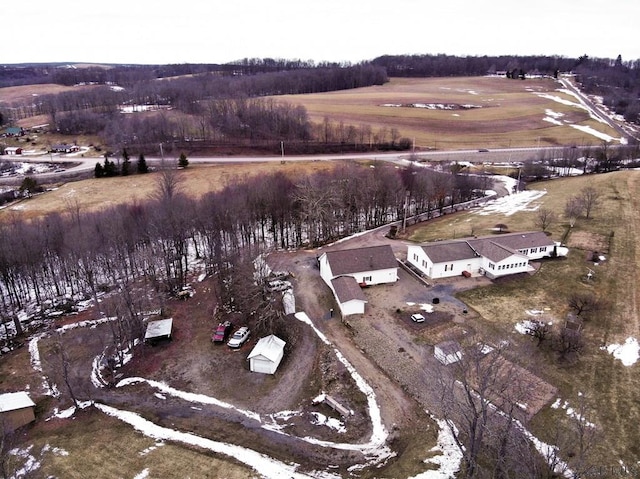 birds eye view of property featuring a rural view