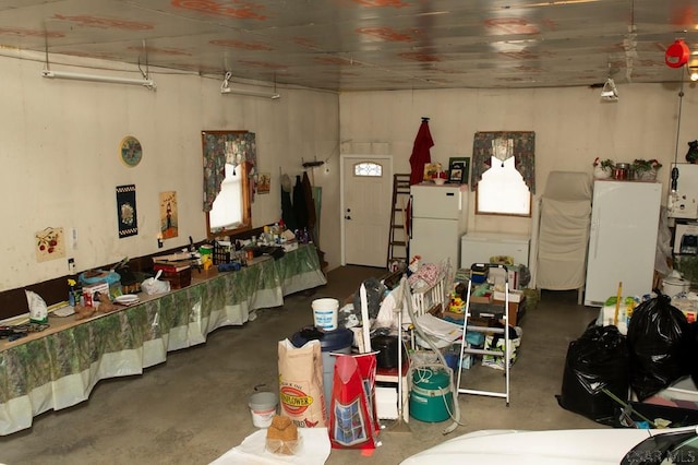 interior space featuring concrete floors