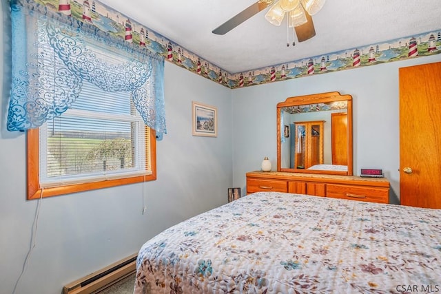 3313 Berlin Plank Rd, Berlin, PA 15530 - bedroom featuring a baseboard radiator and a ceiling fan