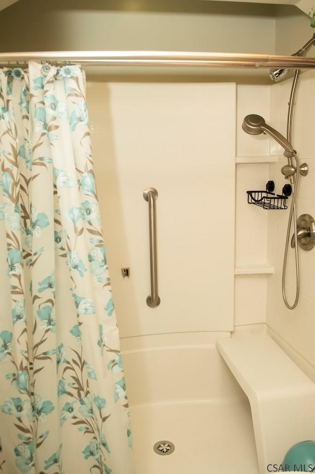 bathroom featuring walk in shower