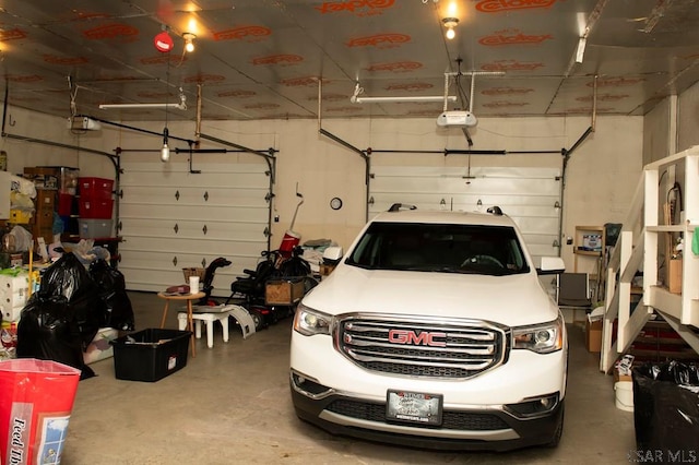 garage featuring a garage door opener