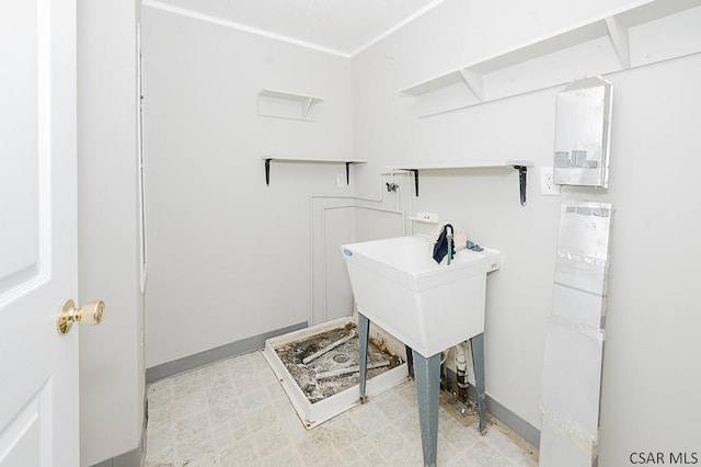 laundry room featuring light floors