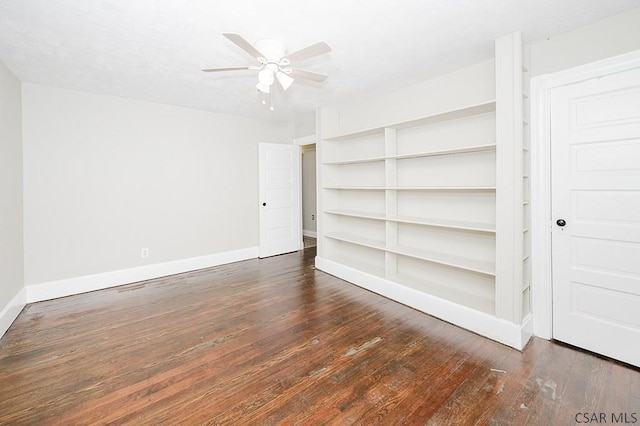 unfurnished room featuring ceiling fan, baseboards, and hardwood / wood-style flooring