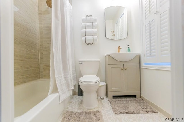full bath featuring baseboards, tile patterned floors, vanity, toilet, and shower / bathtub combination with curtain