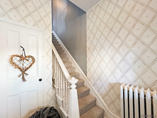 521 N Julian St, Ebensburg, PA 15931 - stairs featuring radiator heating unit