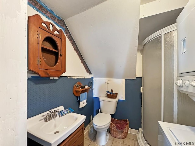 521 N Julian St, Ebensburg, PA 15931 - full bath with lofted ceiling, a shower stall, vanity, and tile patterned floors