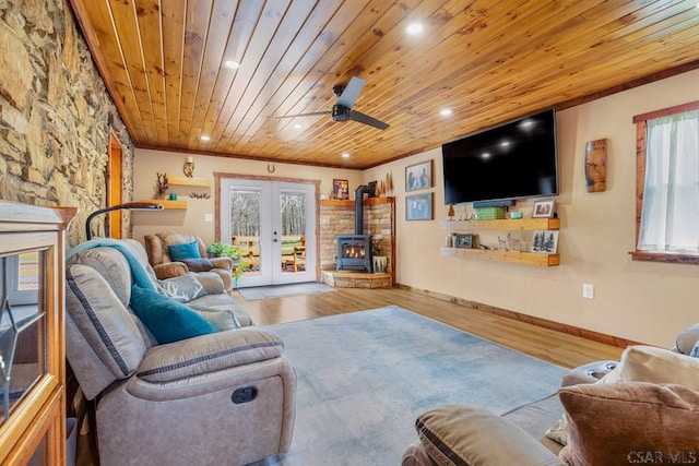 408 Byers Rd, Somerset, PA 15501 - living area featuring wooden ceiling, french doors, a wood stove, and a healthy amount of sunlight