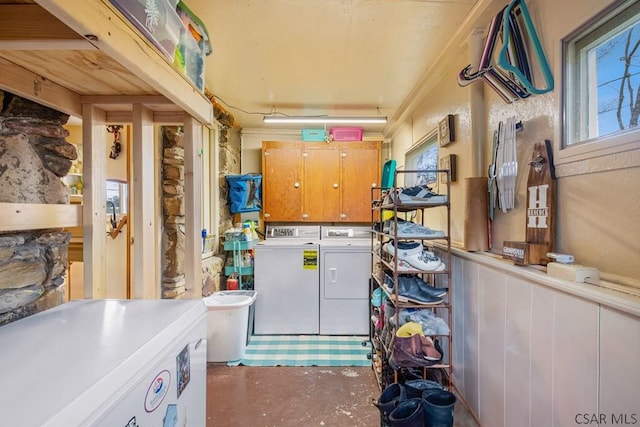 408 Byers Rd, Somerset, PA 15501 - clothes washing area with wainscoting, cabinet space, and washer and clothes dryer