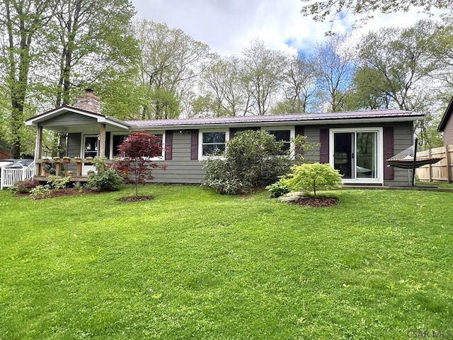 643 Laurel Summit Rd, Boswell, PA 15531 - rear view of house featuring a chimney, metal roof, and a porch