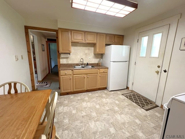 643 Laurel Summit Rd, Boswell, PA 15531 - kitchen featuring freestanding refrigerator, a sink, backsplash, range, and stone finish flooring