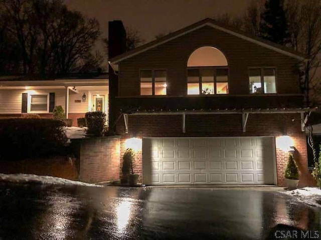 view of front of property featuring a garage