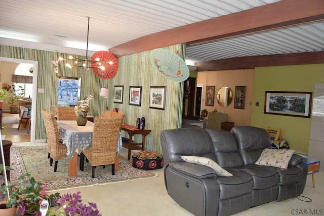 carpeted dining space featuring an inviting chandelier and beam ceiling