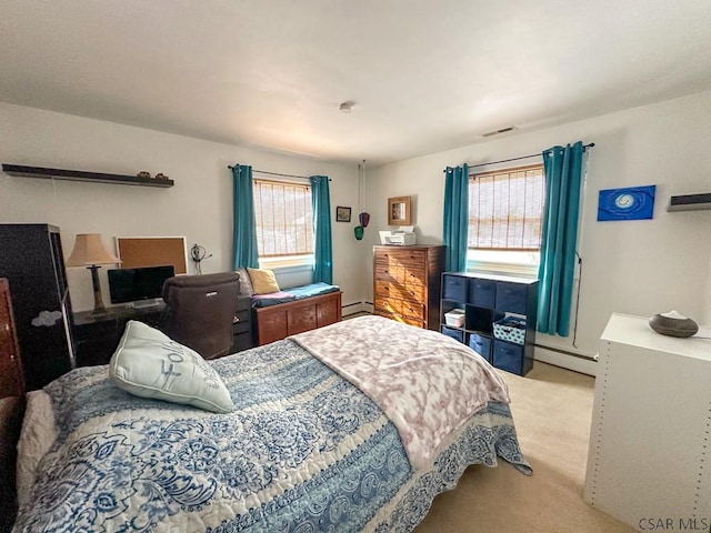 carpeted bedroom featuring multiple windows and a baseboard radiator