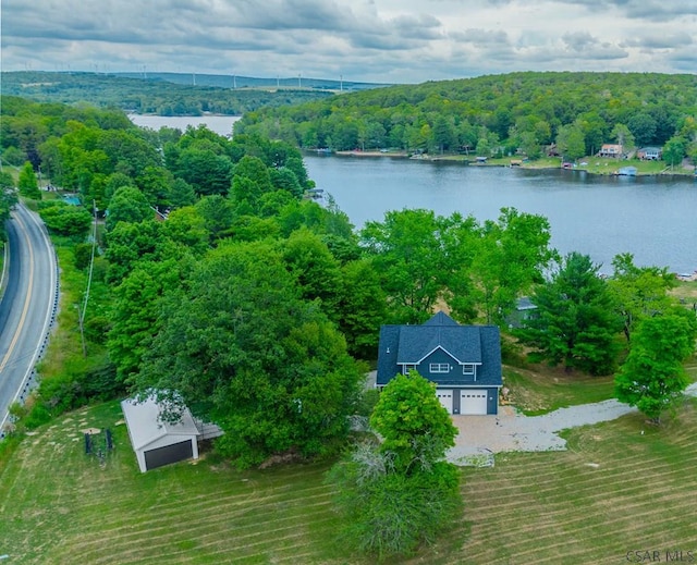 aerial view featuring a rural view and a water view