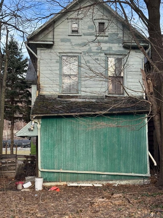 view of side of property featuring cooling unit