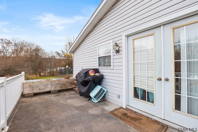 view of patio featuring grilling area and french doors