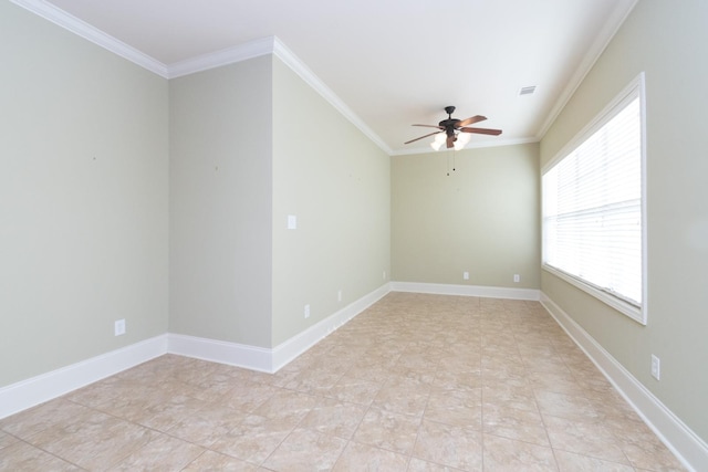 empty room featuring light tile floors, ceiling fan, and crown molding