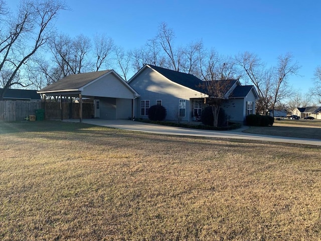114 Joshua St, Perry, GA 31069 - ranch-style house featuring a carport and a front yard