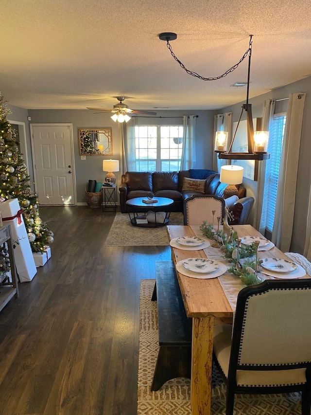 114 Joshua St, Perry, GA 31069 - dining space with a textured ceiling, dark hardwood / wood-style floors, and ceiling fan with notable chandelier