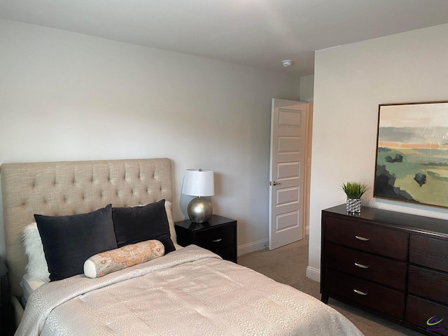 bedroom with dark carpet