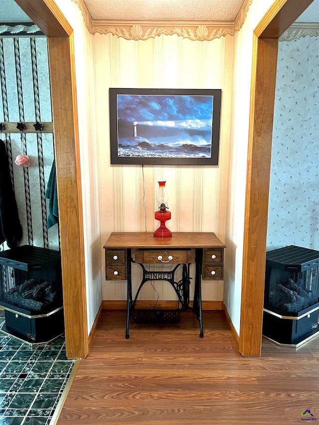 2382 Gallimore Mill Rd, Jeffersonville, GA 31044 - detailed view of a wood stove, wallpapered walls, and wood finished floors
