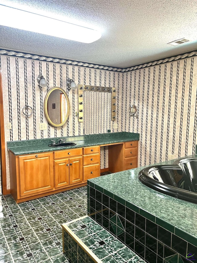2382 Gallimore Mill Rd, Jeffersonville, GA 31044 - bathroom with a textured ceiling and vanity