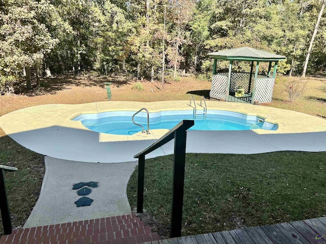 2382 Gallimore Mill Rd, Jeffersonville, GA 31044 - outdoor pool featuring a gazebo, a patio area, view of scattered trees, and a lawn