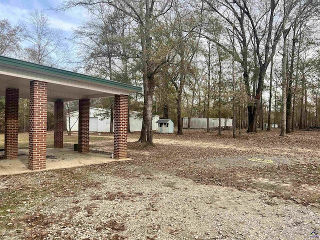 2382 Gallimore Mill Rd, Jeffersonville, GA 31044 - view of yard featuring a storage shed