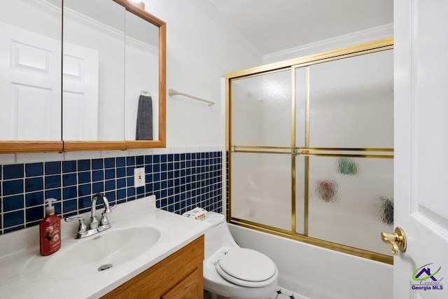 full bathroom featuring vanity, toilet, ornamental molding, and enclosed tub / shower combo