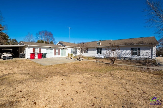 single story home with a carport and a front yard