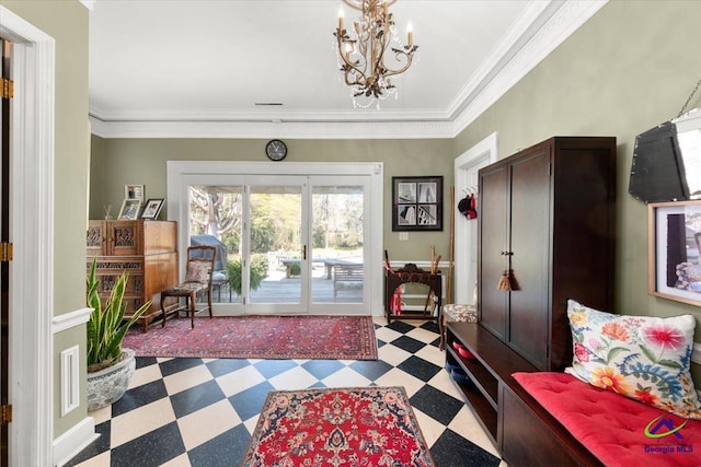 interior space with an inviting chandelier and ornamental molding