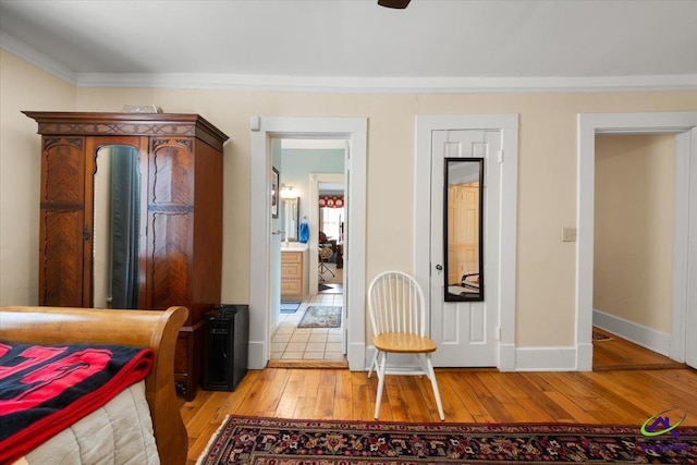 tiled bedroom featuring ornamental molding