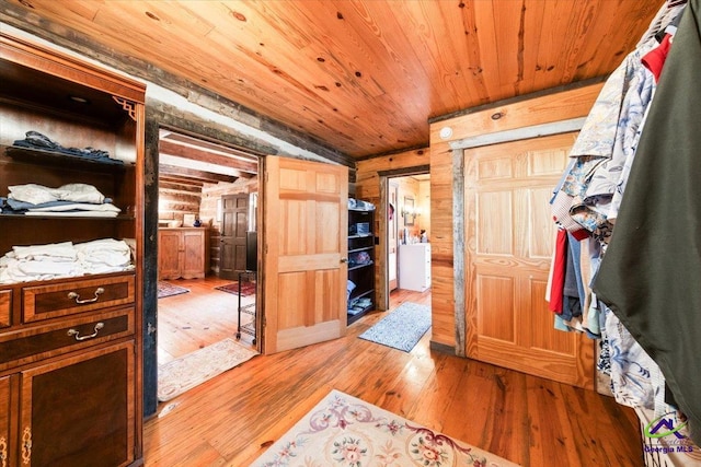 spacious closet with light hardwood / wood-style flooring