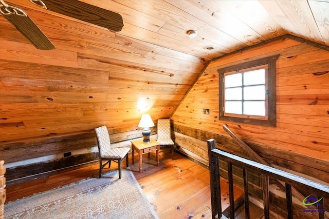 interior space with wood ceiling, lofted ceiling, and wood-type flooring